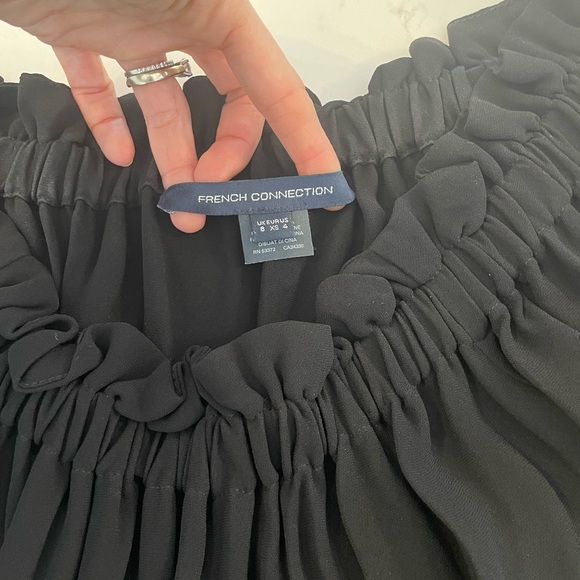 Flowy black French Connection top.  Off the shoulder or covered shoulders. - Picture 3 of 3
